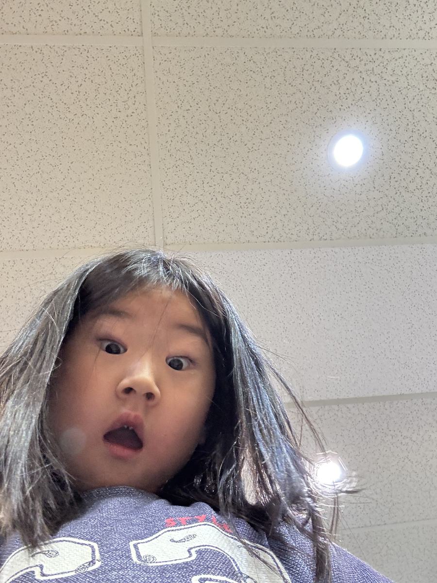 A student pulling a surprised face at the camera