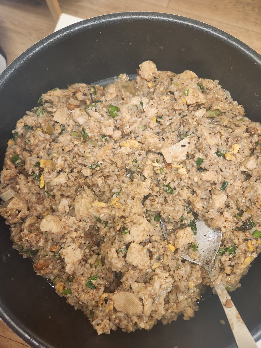 A large pan of vegetable fried rice
