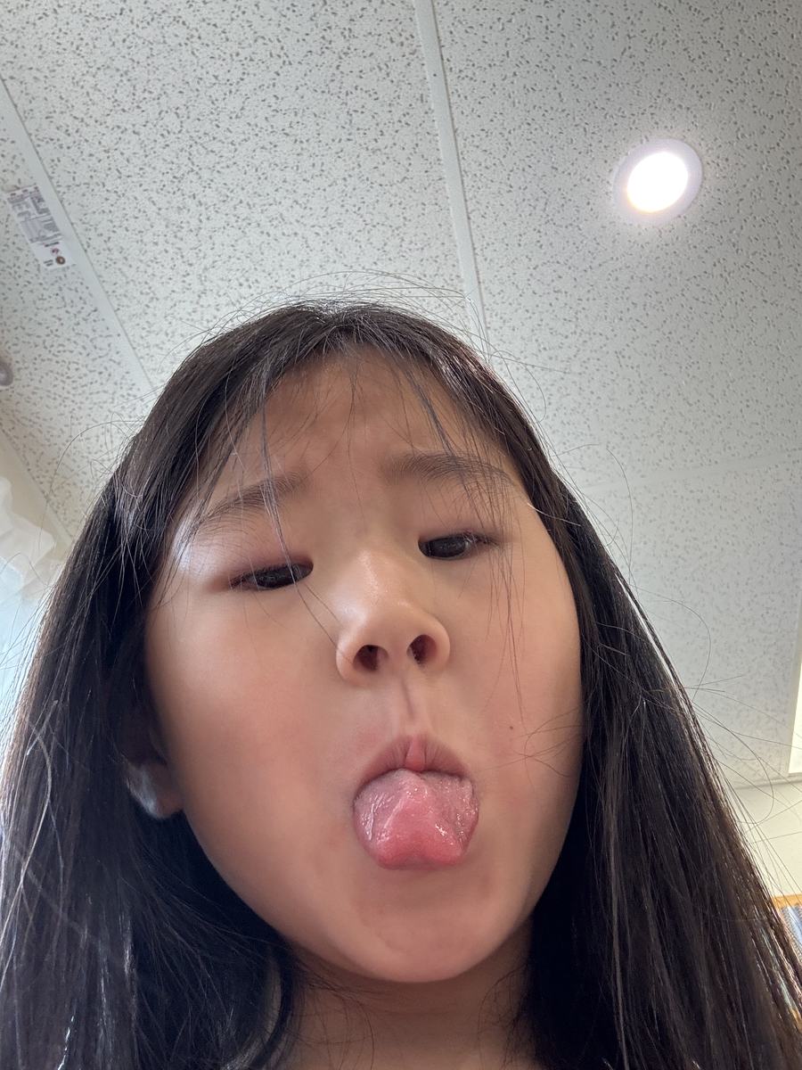 A student pulling a cheerful face at the camera