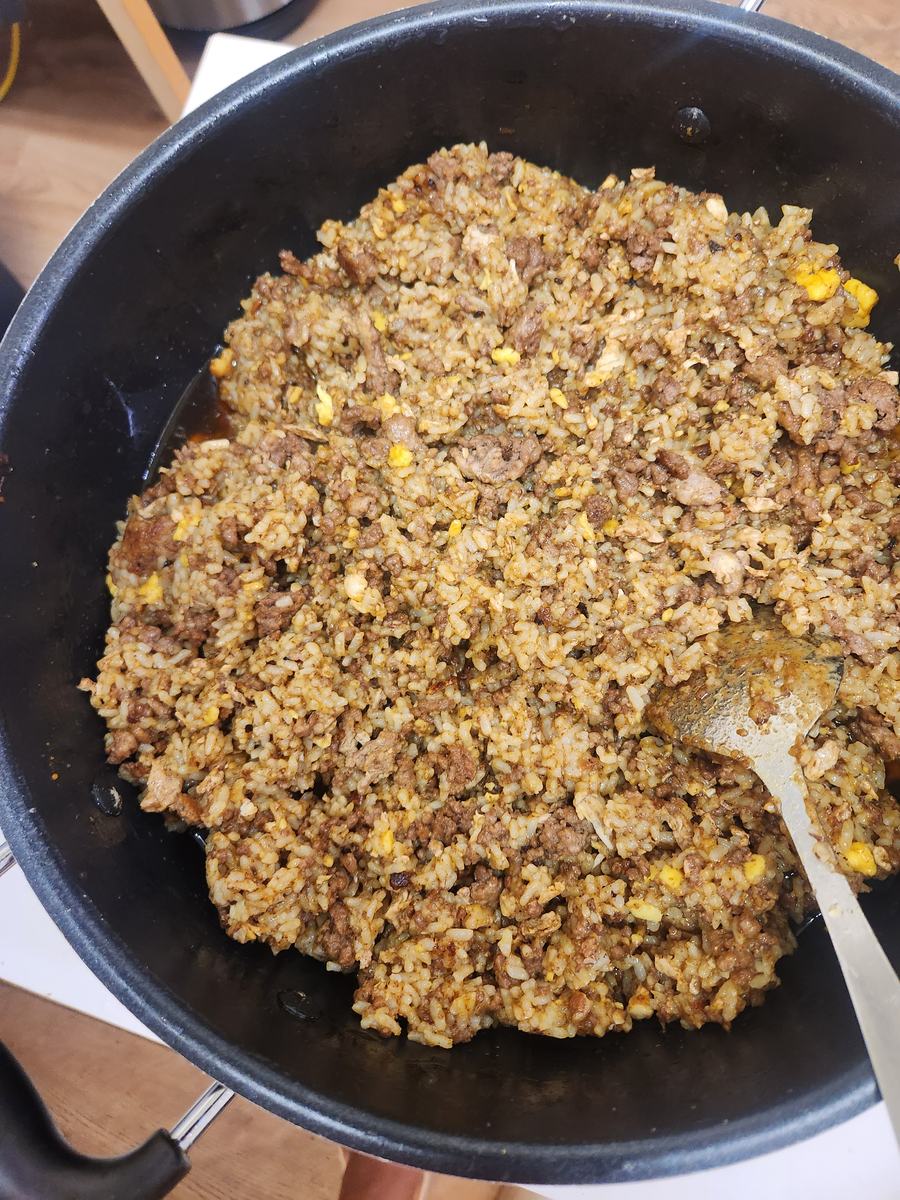 A large pan of beef fried rice