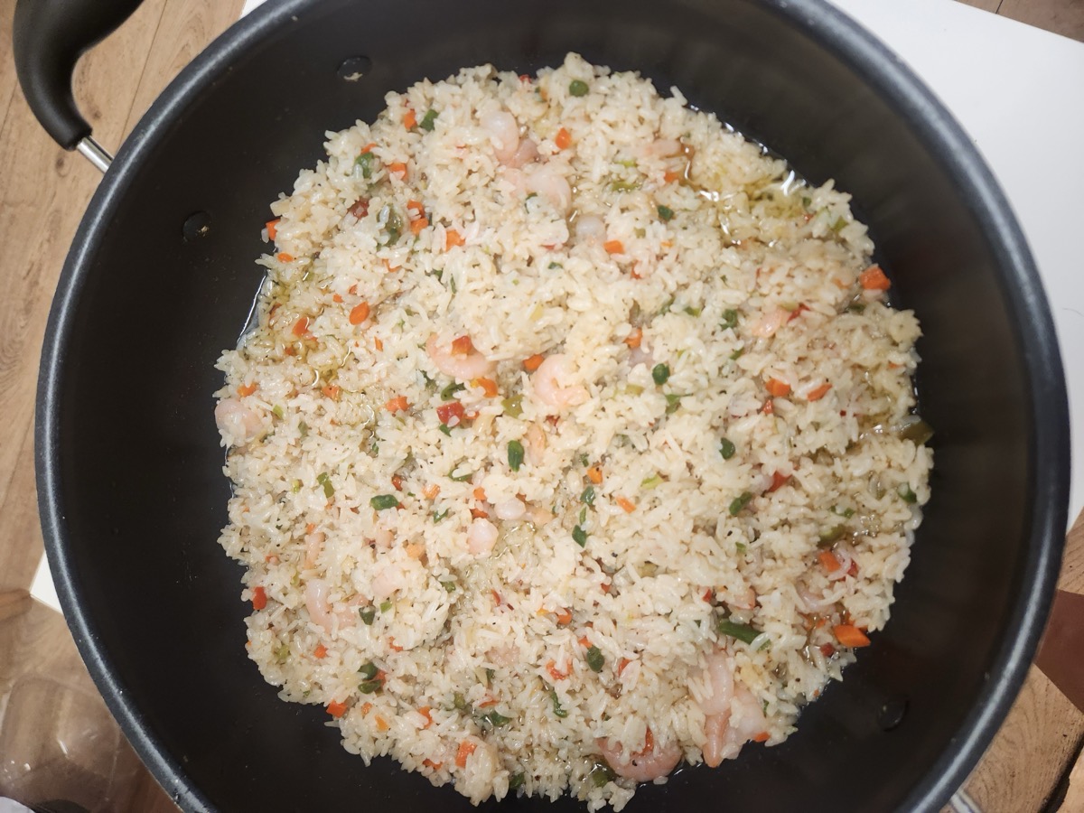 A large pan of vegetable fried rice
