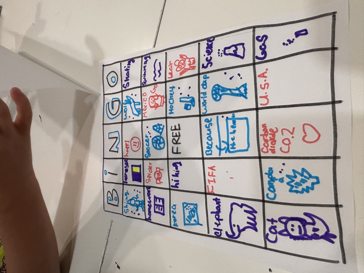 A finished handmade BINGO card with words and little drawings