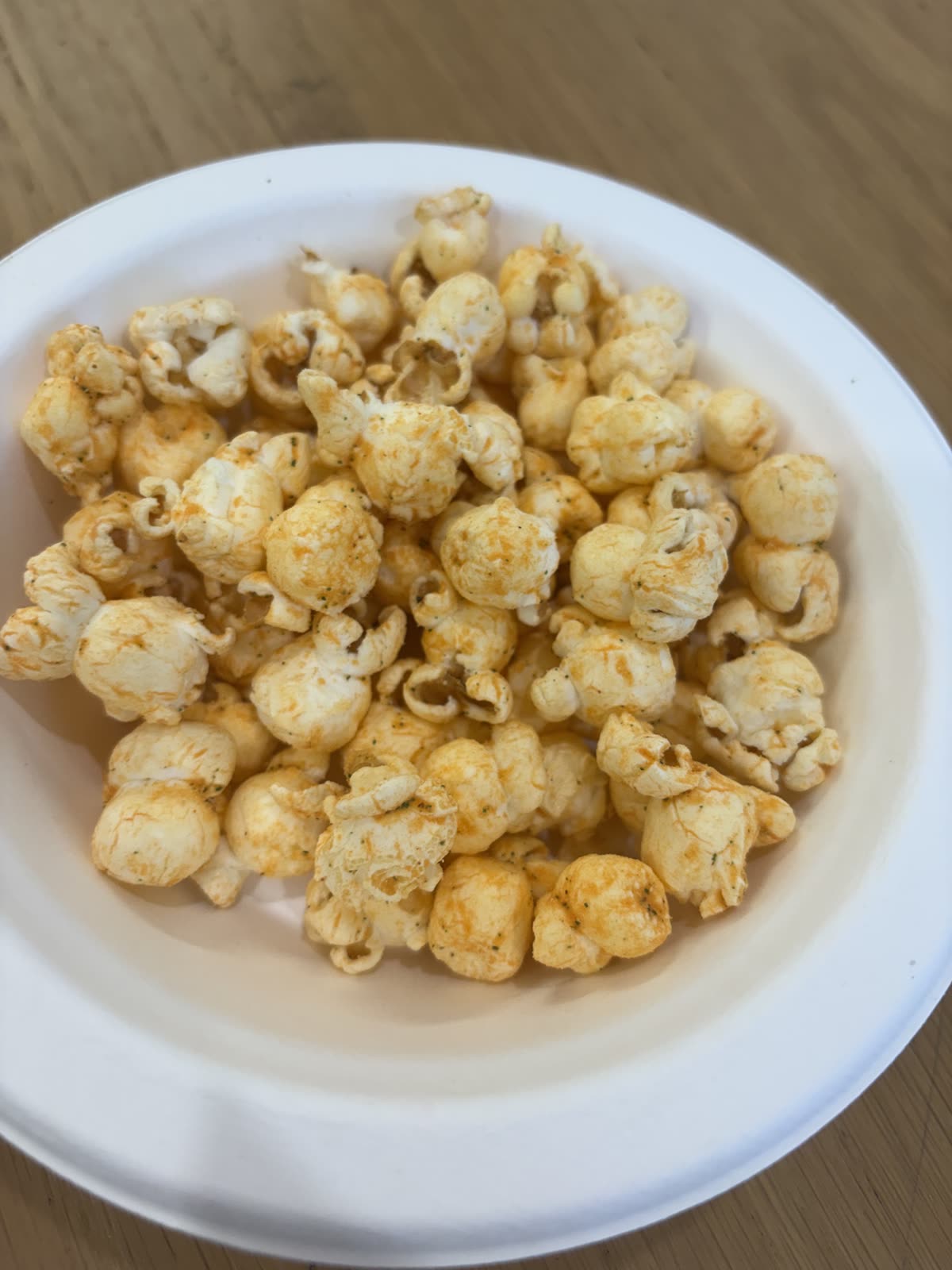 A bowl filled with seasoned popcorn